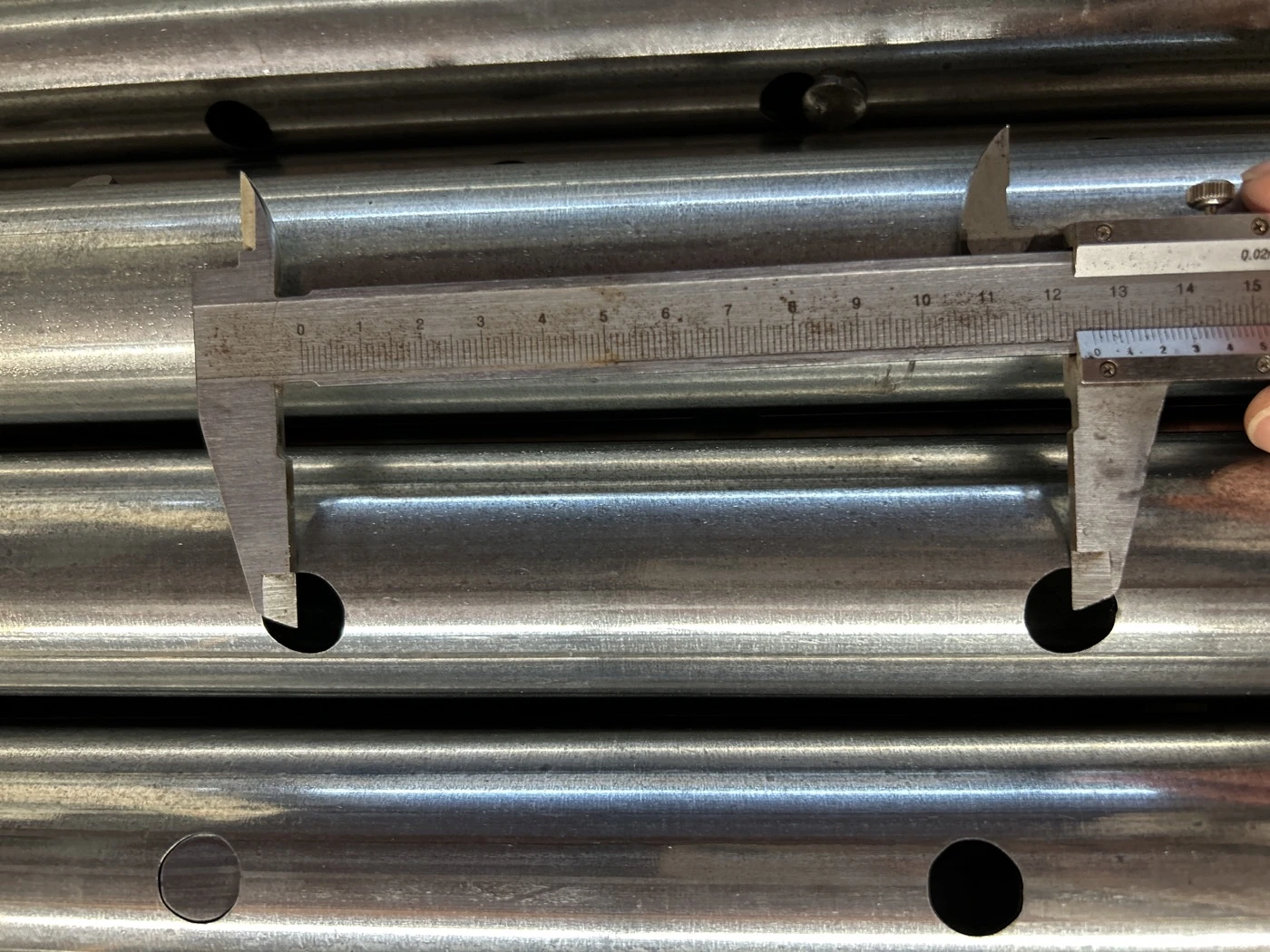 Steel prop tube hole dimension inspection