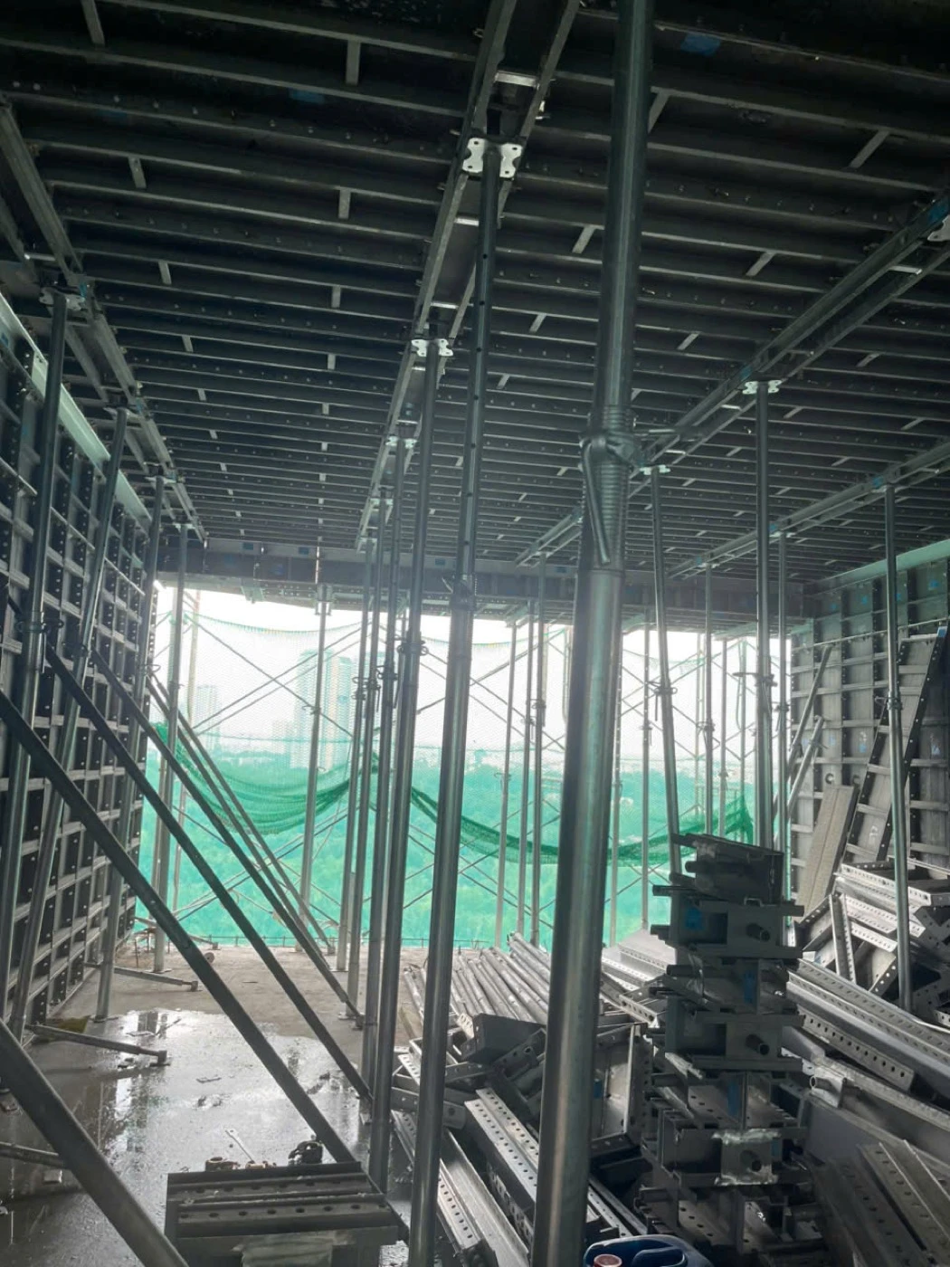 Steel props supporting formwork on site